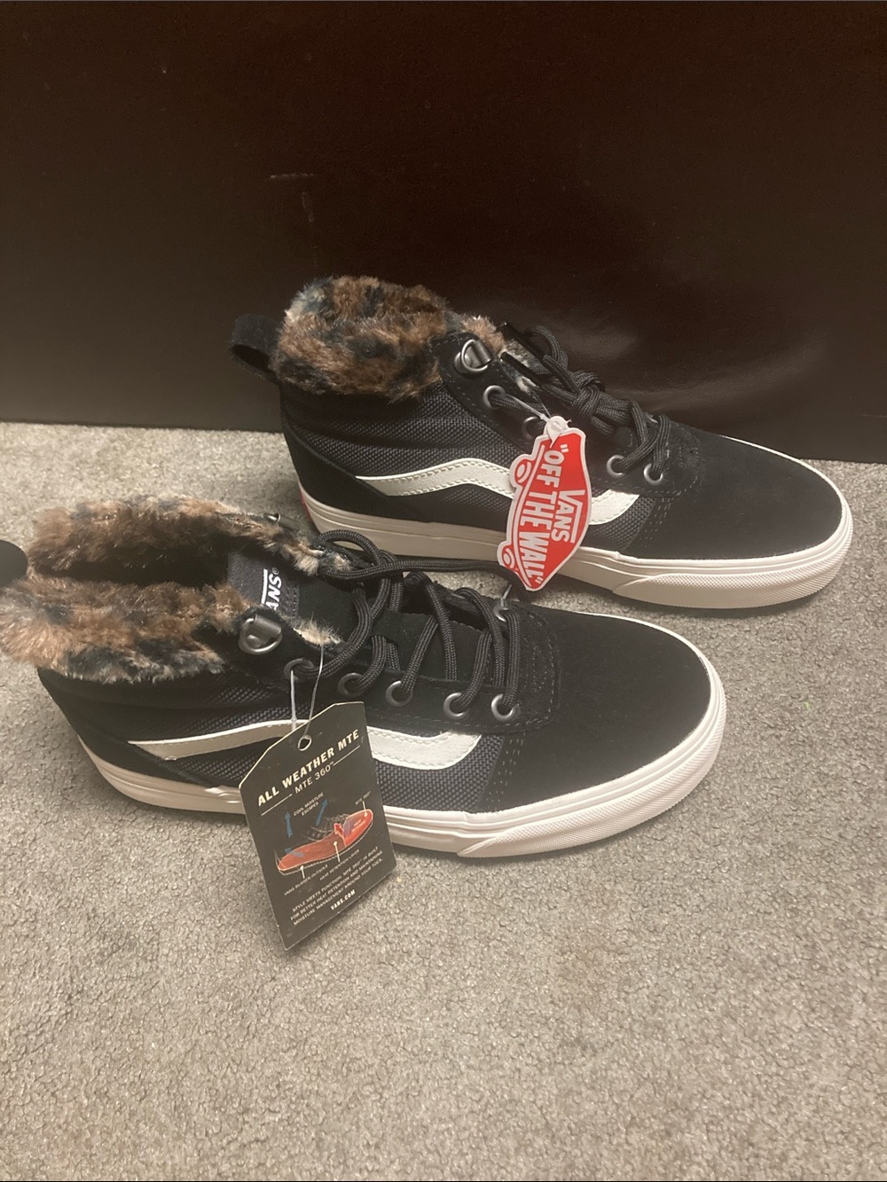 Vans Black and White High-Top Sneakers with Faux Fur Lining